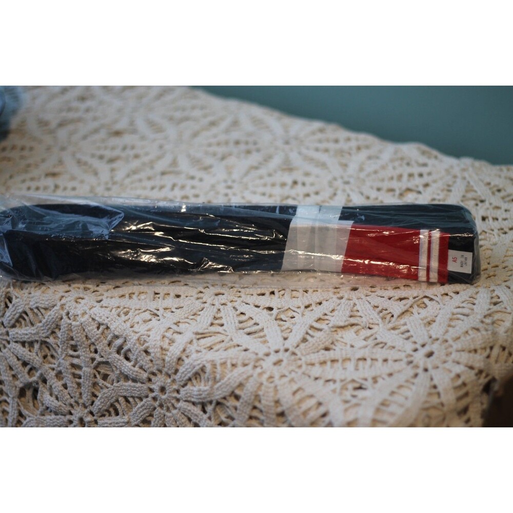 Brazilian Jiu-Jitsu (BJJ) Black Belt with a Professor's Bar
